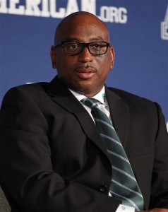 Tulane coach Curtis Johnson listens to a question during a round table discussion at the American Athletic Conference NCAA college football media days in Newport, R.I., Tuesday, Aug. 4, 2015. (AP Photo/Stew Milne)