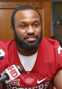 Oklahoma running back Samaje Perine talks with members of the media during Oklahoma NCAA college football media day in Norman, Okla., Saturday, Aug. 8, 2015. This season, Perine wil, try to follow up one of the best seasons for a freshman back in Football Bowl Subdivision history. (AP Photo/Sue Ogrocki)
