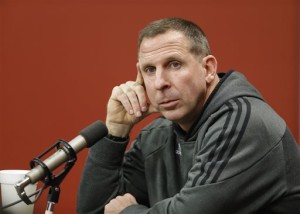 ADVANCE FOR DEC 28 2014, FILE  In this file photo from Nov. 24, 2014, Nebraska NCAA college football head coach Bo Pelini participates in a news conference in Lincoln, Neb. The Pelini story, in which Nebraska head football coach Bo Pelini was fired after seven seasons and a 9-3 campaign this year, has been voted the No, 3 story by Associated Press newspaper and broadcast members in Nebraska . (AP Photo/Nati Harnik, File)