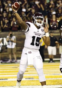 Mississippi State quarterback Dak Prescott (15) readies to pass against Southern Mississippi during an NCAA college football game in Hattiesburg Miss., Saturday, Sept. 5, 2015. (AP Photo/Rogelio V. Solis)