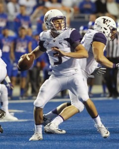 Washington quarterback Jake Browning (3) looks for a receiver during the first half of an NCAA college football game against Boise State in Boise, Idaho, on Friday, Sept. 4, 2015. (AP Photo/Otto Kitsinger)