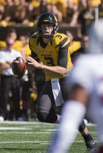 Missouri quarterback Drew Lock scrambles as he looks for a receiver during the third quarter of an NCAA college football game against South Carolina Saturday, Oct. 3, 2015, in Columbia, Mo. Missouri won the game 24-10. (AP Photo/L.G. Patterson)