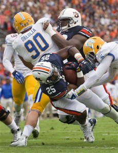 Auburn running back Peyton Barber (25) scores a touchdown during the first half of an NCAA college football game against San Jose State, Saturday, Oct. 3, 2015, in Auburn, Ala. (AP Photo/Brynn Anderson)