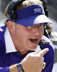 TCU head coach Gary Patterson talks with players in the second quarter of an NCAA college football game against Texas, Saturday, Oct. 3, 2015, in Fort Worth, Texas. (AP Photo/Ron Jenkins)