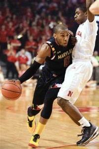 Maryland's Rasheed Sulaimon (0) drives around Nebraska's Glynn Watson Jr. (5) during the first half of an NCAA college basketball game in Lincoln, Neb., Wednesday, Feb. 3, 2016. (AP Photo/Nati Harnik)