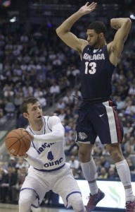 BYU guard Nick Emery (4) takes the ball to the hoop over Gonzaga guard Josh Perkins (13) during an NCAA college basketball game Saturday, Feb. 27, 2016, in Provo, Utah. (Dominic Valente/Daily Herald via AP)