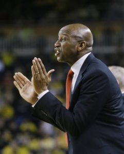 In this Feb. 22, 2015 photo, Ohio State assistant coach Dave Dickerson yells from the bench during the first half of an NCAA college basketball game against Michigan in Ann Arbor, Mich. More and more minority coaches in college sports, particularly in basketball and football, are finding it increasingly difficult to find head jobs. (AP Photo/Carlos Osorio)